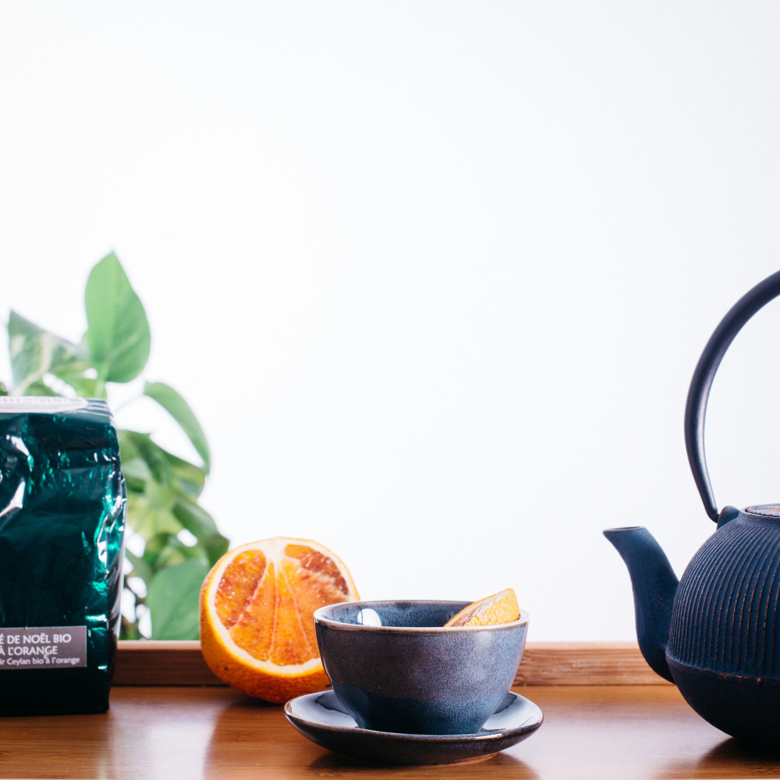 Tea and citrus still life with product packaging for Herman Organic product mood